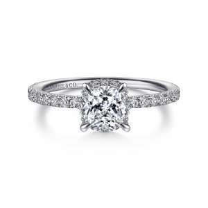 Gabriel & Co. ER14719C4W44JJ 14 karat white gold Classic engagement ring, front view of a cushion shaped center in four rounded claws on a thin band of small diamonds