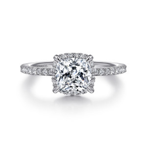 Gabriel & Co. ER14719C6W44JJ 14 karat white gold Classic engagement ring, front view of a cushion cut seat with corner claws and small diamonds peeking out around its base