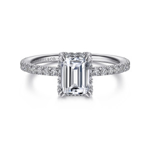 Gabriel & Co. ER14719E4PT4JJ platinum Classic engagement ring, front view of an emerald cut center in corner prongs with small diamonds along the shoulders