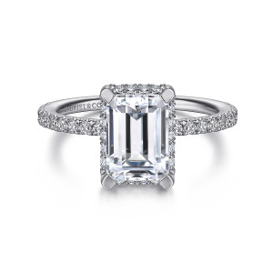 Gabriel & Co. ER14719E8W44JJ 14 karat white gold Classic engagement ring, front view of an emerald cut center in blocky corner prongs with diamonds tucked beneath