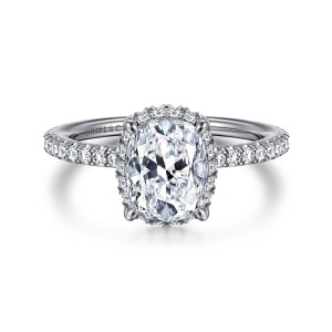 Gabriel & Co. ER14719G8W44JJ 14 karat white gold Classic engagement ring, front view of the elongated cushion center framed by small stones peeking out around its edges