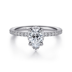 Gabriel & Co. ER14719P4W44JJ 14 karat white gold Classic engagement ring, front view of a pear shaped center with a V tip at the point above a diamond band