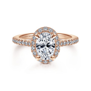 Gabriel & Co. ER14725O4K44JJ 14 karat rose gold Classic engagement ring, front view of an oval center framed by a single halo of round diamonds and slim claws