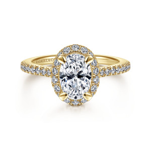 Gabriel & Co. ER14725O4Y44JJ 14 karat yellow gold Classic engagement ring, front view of an oval center inside a ring of small round diamonds above a slim band