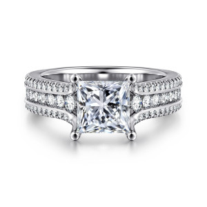 Gabriel & Co. ER14890S6W44JJ 14 karat white gold Contemporary engagement ring, front view of a princess cut center between rows of channel set and pave stones