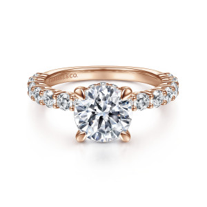 Gabriel & Co. ER14893R8K44JJ 14 karat rose gold Classic engagement ring, front view of a round center flanked by round stones set in shared prongs along both shoulders