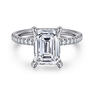 Gabriel & Co. ER14914E12W44JJ 14 karat white gold Classic engagement ring, front view of an emerald cut center on four tall claw prongs with diamonds along the band