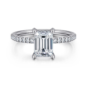 Gabriel & Co. ER14914E6W44JJ 14 karat white gold Classic engagement ring, front view of an emerald cut center in four rounded prongs above a fine band of round diamonds