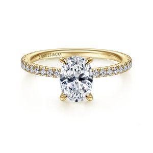 Gabriel & Co. ER14914O4Y44JJ 14 karat yellow gold Classic engagement ring, front view of an oval center with four claw prongs and small round diamonds on a thin band