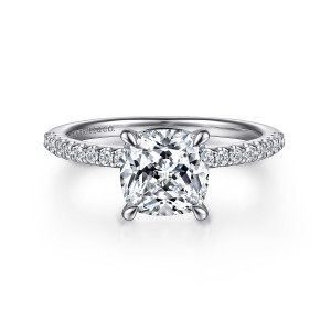 Gabriel & Co. ER14918C8W44JJ 14 karat white gold Classic engagement ring, front view of a cushion cut center in four claws above stones running along the shoulders
