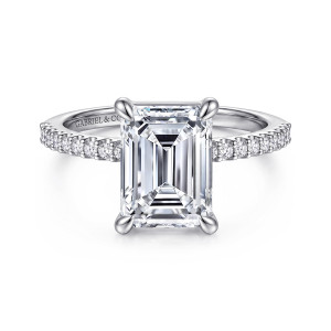 Gabriel & Co. ER14918E12W44JJ 14 karat white gold Classic engagement ring, front view of the emerald cut center between four rounded prong tips and diamonds on the band