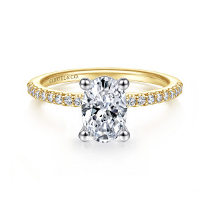 Gabriel & Co. ER14918O4M44JJ 14 karat white and yellow gold Classic engagement ring, front view of an oval center held by four rounded prongs above a band of small diamonds