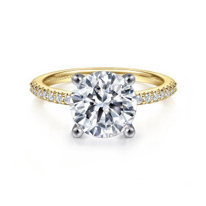 Gabriel & Co. ER14918R12M44JJ 14 karat white and yellow gold Classic engagement ring, front view of a round center in ball tipped prongs with diamonds along the shoulders