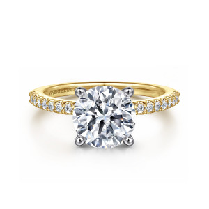 Gabriel & Co. ER14918R8M44JJ 14 karat white and yellow gold Classic engagement ring, front view of a round center on rounded prongs with small stones along the shoulders