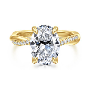 Gabriel & Co. ER14922O12Y44JJ 14 karat yellow gold Contemporary engagement ring, front view of an oval center held by four rounded prongs above a band crossing over itself