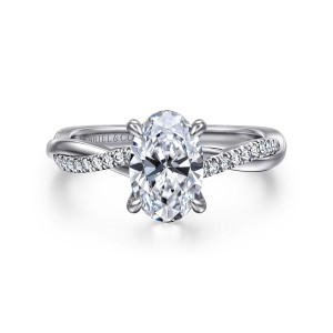 Gabriel & Co. ER14922O6PT4JJ platinum Contemporary engagement ring, front view of an oval center in claw prongs above a twisting band lined with small diamonds