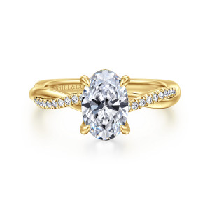 Gabriel & Co. ER14922O6Y44JJ 14 karat yellow gold Contemporary engagement ring, front view of an oval center on four prongs above a crossing band set with small diamonds