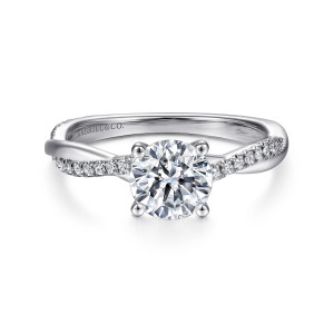 Gabriel & Co. ER14922R4PT4JJ platinum Contemporary engagement ring, front view of a round center in four prongs with small stones on the crossing strands