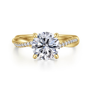 Gabriel & Co. ER14922R8Y44JJ 14 karat yellow gold Contemporary engagement ring, front view of a round center between four tapered prongs with stones curling along the band