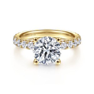 Gabriel & Co. ER14941R8Y44JJ 14 karat yellow gold Classic engagement ring, front view of a round center on four ball tipped prongs above stones along the shoulders