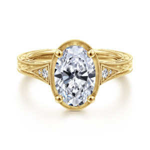 Gabriel & Co. ER14961O8Y44JJ 14 karat yellow gold Victorian engagement ring, front view of the oval center in a beaded rim, with engraved leaf shoulders and tiny diamonds
