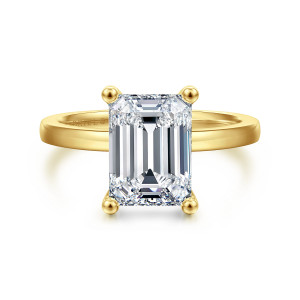 Gabriel & Co. ER14982E12Y4JJJ 14 karat yellow gold Classic engagement ring, front view of an emerald cut center held at its corners by four ball tipped prongs