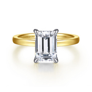 Gabriel & Co. ER14982E8M4JJJ 14 karat white and yellow gold Classic engagement ring, front view of an emerald cut center held at its corners by claw prongs