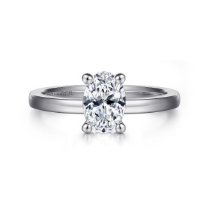 Gabriel & Co. ER14982O5W4JJJ 14 karat white gold Classic engagement ring, front view of an oval center in four ball tipped prongs on a plain flat sided band