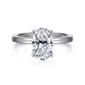 Gabriel & Co. ER14982O8W4JJJ 14 karat white gold Classic engagement ring, front view of an oval center in ball tipped prongs above a flat topped band