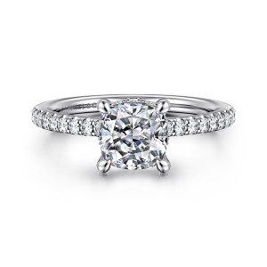 Gabriel & Co. ER14987C6W44JJ 14 karat white gold Classic engagement ring, front view of a cushion cut center in claw prongs above diamonds set along the band