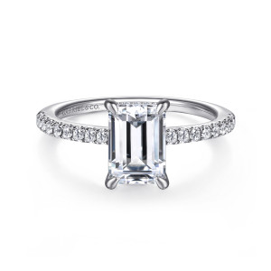 Gabriel & Co. ER14987E8PT4JJ platinum Classic engagement ring, front view of an emerald cut center in four rounded claws above a slim band of round stones