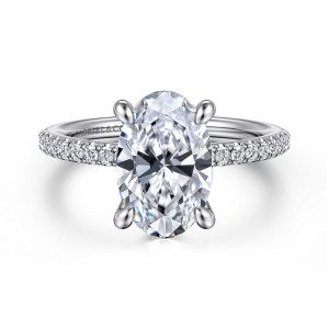 Gabriel & Co. ER14987O12PT4JJ platinum Classic engagement ring, front view of an oval center with four rounded prongs and small round diamonds along the shoulders