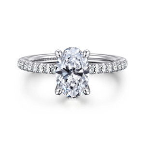 Gabriel & Co. ER14987O6W44JJ 14 karat white gold Classic engagement ring, front view of an oval center with four claw prongs above small round diamonds on the band