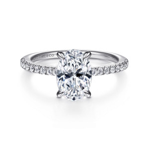 Gabriel & Co. ER14987O8PT4JJ platinum Classic engagement ring, front view of an oval center with round diamonds along the slim band