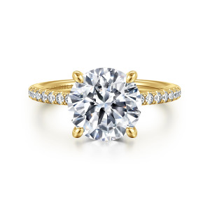 Gabriel & Co. ER14987R12Y44JJ 14 karat yellow gold Classic engagement ring, front view of a round center in four rounded tip prongs with diamonds along the shoulders
