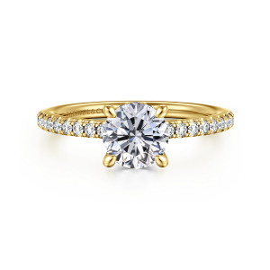 Gabriel & Co. ER14987R4Y44JJ 14 karat yellow gold Classic engagement ring, front view of a round center on four claw prongs above a slim diamond band