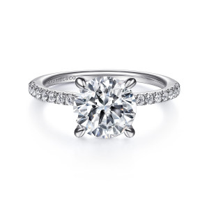 Gabriel & Co. ER14987R8W44JJ 14 karat white gold Classic engagement ring, front view of a round center in pointed prongs above a thin band of small diamonds