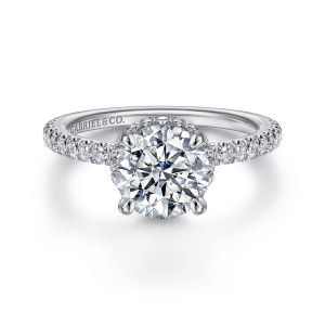 Gabriel & Co. ER14992R6W44JJ 14 karat white gold Contemporary engagement ring, front view of a round center in slim prongs with small stones glimpsed behind its edge