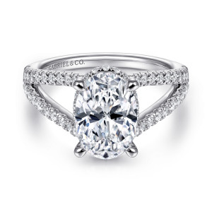 Gabriel & Co. ER14994O8W44JJ 14 karat white gold Contemporary engagement ring, front view of an oval center with four prongs and a split shank of small diamonds