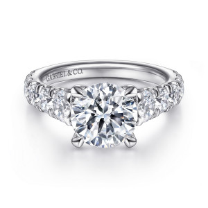 Gabriel & Co. ER14999R8W44JJ 14 karat white gold Contemporary engagement ring, front view of a round center flanked by round stones set along both shoulders