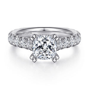 Gabriel & Co. ER15000C8W44JJ 14 karat white gold Contemporary engagement ring, front view of a cushion shaped center held by twin claws at each corner above wide diamond shoulders