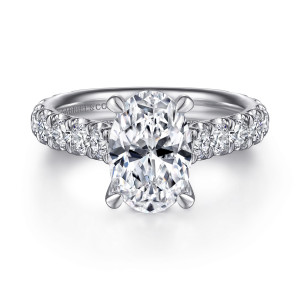 Gabriel & Co. ER15000O8W44JJ 14 karat white gold Contemporary engagement ring, front view of the oval center between rows of large round diamonds on the broad band