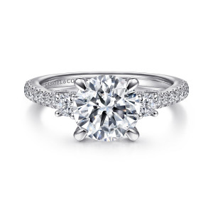 Gabriel & Co. ER15001R8W44JJ 14 karat white gold Contemporary engagement ring, front view of a round center flanked by a larger round diamond on each side