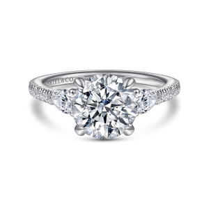 Gabriel & Co. ER15004R8W44JJ 14 karat white gold Contemporary engagement ring, front view of a round center between two pear shaped stones with small stones on the shoulders