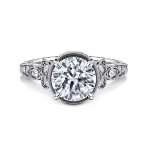 Gabriel & Co. ER15187R8W44JJ 14 karat white gold Floral Nouveau engagement ring, front view of a round center in a beaded edge collar with leaf shaped settings at each side