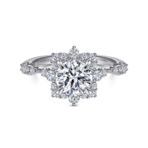 Gabriel & Co. ER15195R4PT4JJ platinum Starlight engagement ring, front view of a round center in a pointed square halo with a larger stone at the top