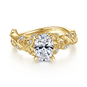 Gabriel & Co. ER15207O4Y44JJ 14 karat yellow gold Floral Nouveau engagement ring, front view of the oval center between leaf pockets with milgrain edges and curled scrolls