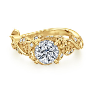 Gabriel & Co. ER15207R4Y44JJ 14 karat yellow gold Floral Nouveau engagement ring, front view of a round center in four prongs, ringed by beaded leaf settings holding small diamonds