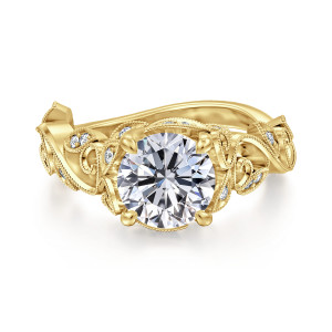 Gabriel & Co. ER15207R6Y44JJ 14 karat yellow gold Floral Nouveau engagement ring, front view of a round center among beaded leaf and scroll shapes set with tiny diamonds