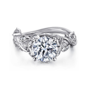 Gabriel & Co. ER15207R8W44JJ 14 karat white gold Floral Nouveau engagement ring, front view of a round center in a beaded collar with leaf panels curling at both shoulders